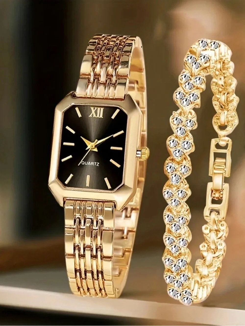 Gold Tone Women's Quartz Watch with Black Dial and Crystal Bracelet